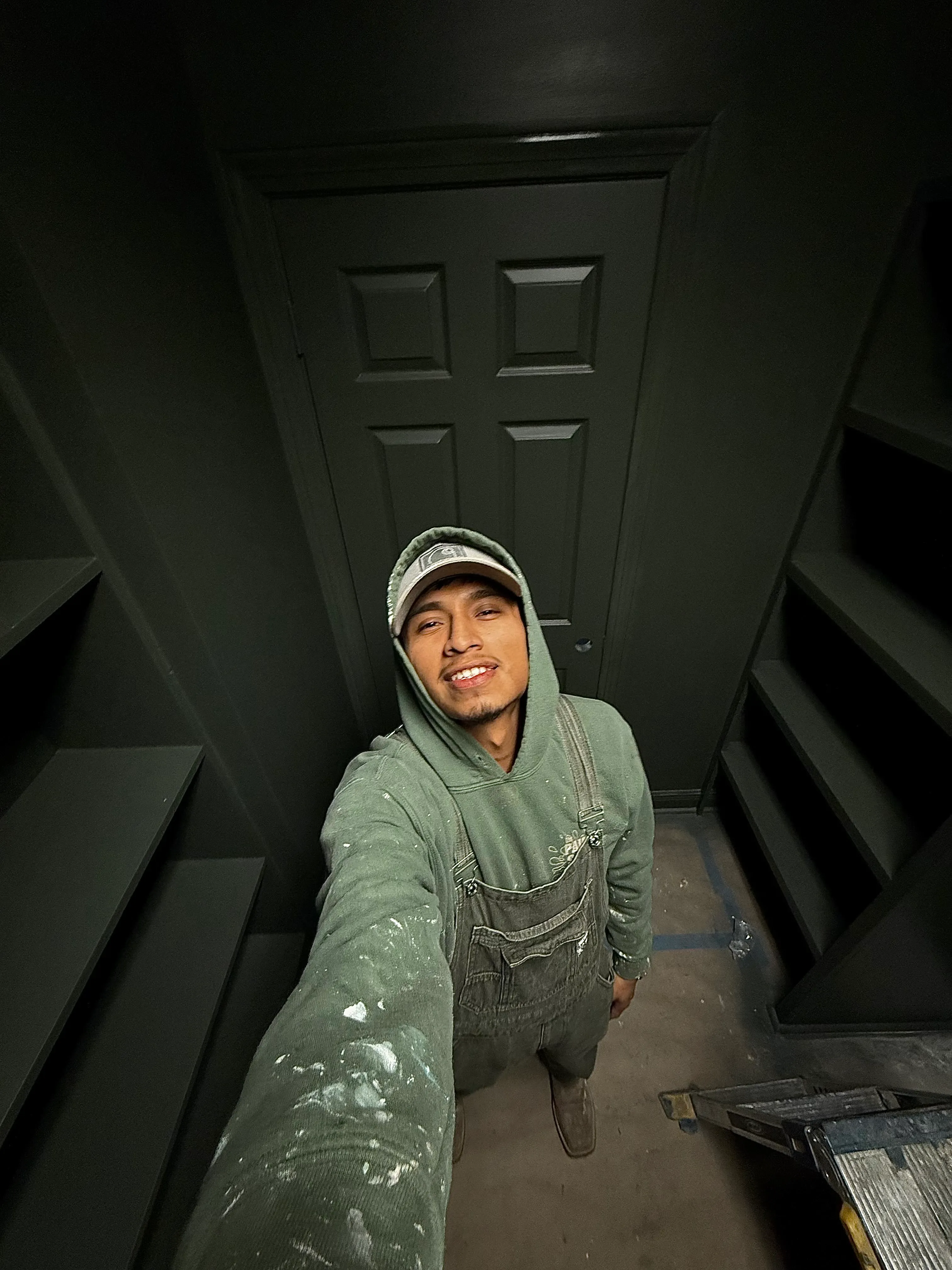 Saul Velasquez, owner of Ivy's Painting Services LLC, on a job site.